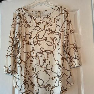 Very pretty top with neutral colors.